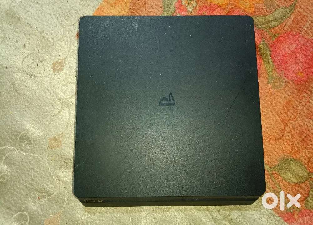 Ps4 1tb Like New Condition With 15 Games with 2 Controler