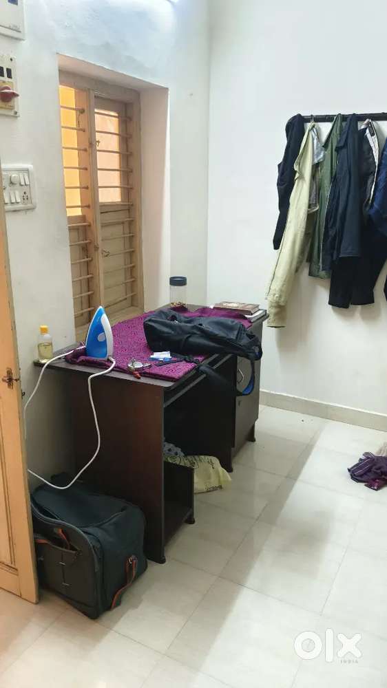 We are looking working professional for room sharing