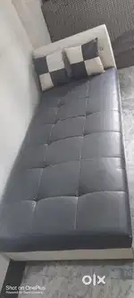 Kids bed can be used as sofa.made up of leather with two cousins