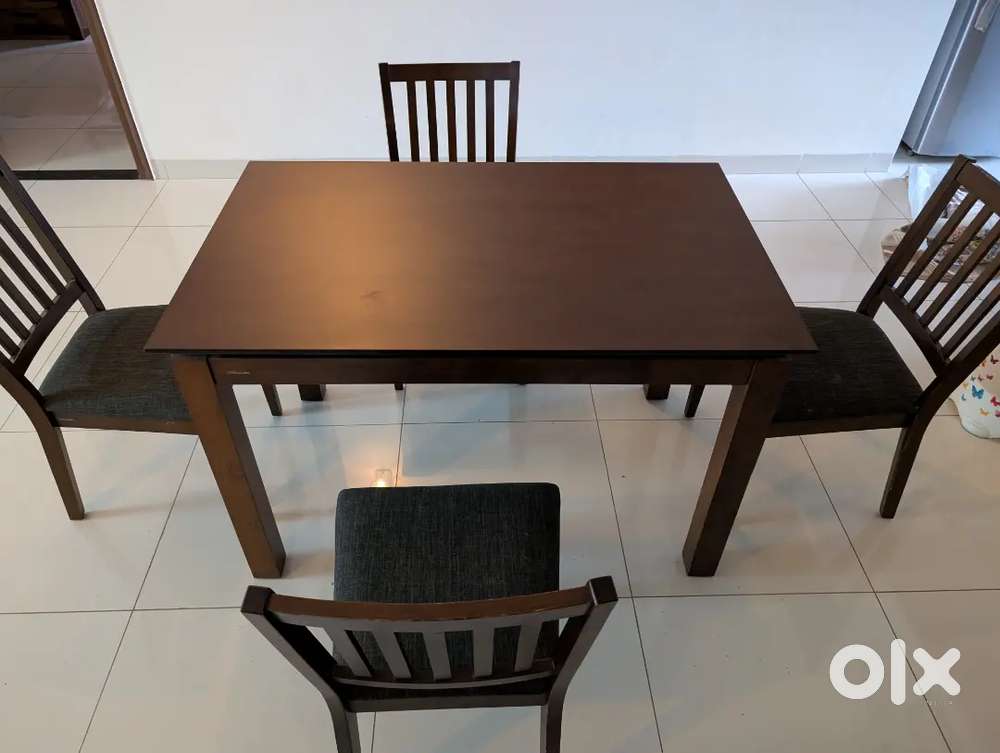 4 Seater Dining Table with chairs from Urban Ladder