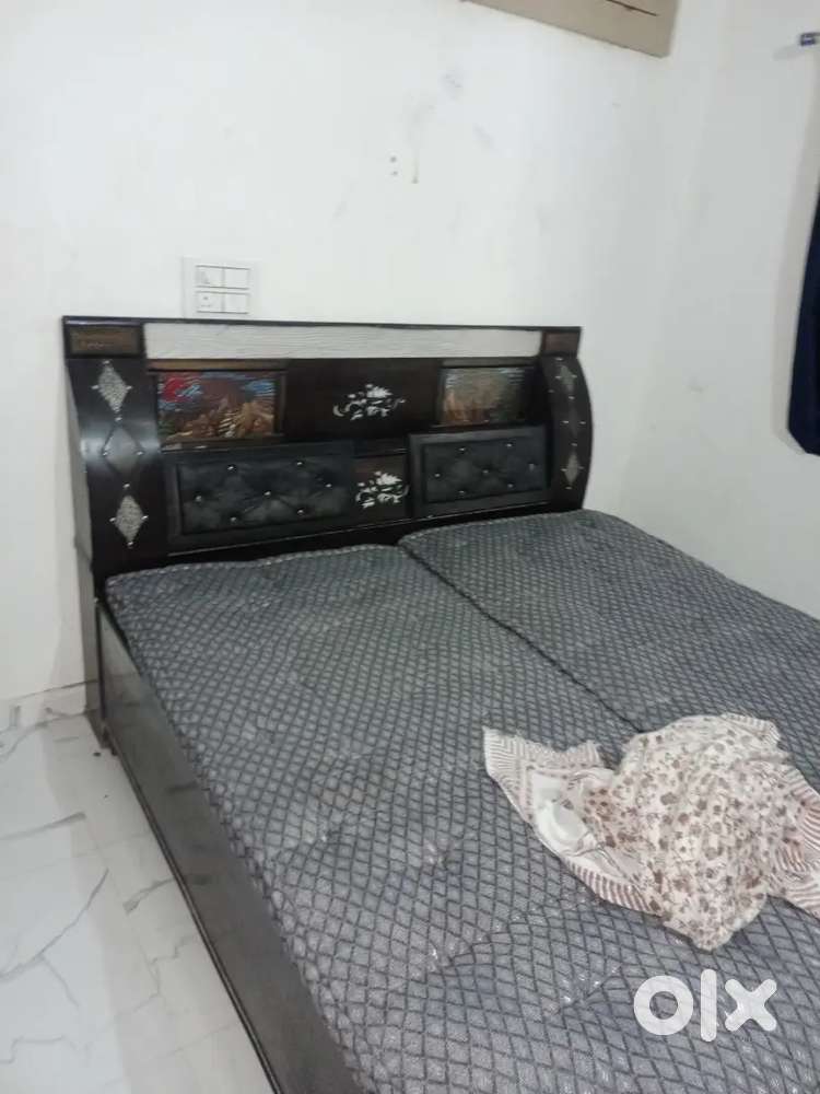 Double bed with box attached s and dressing table