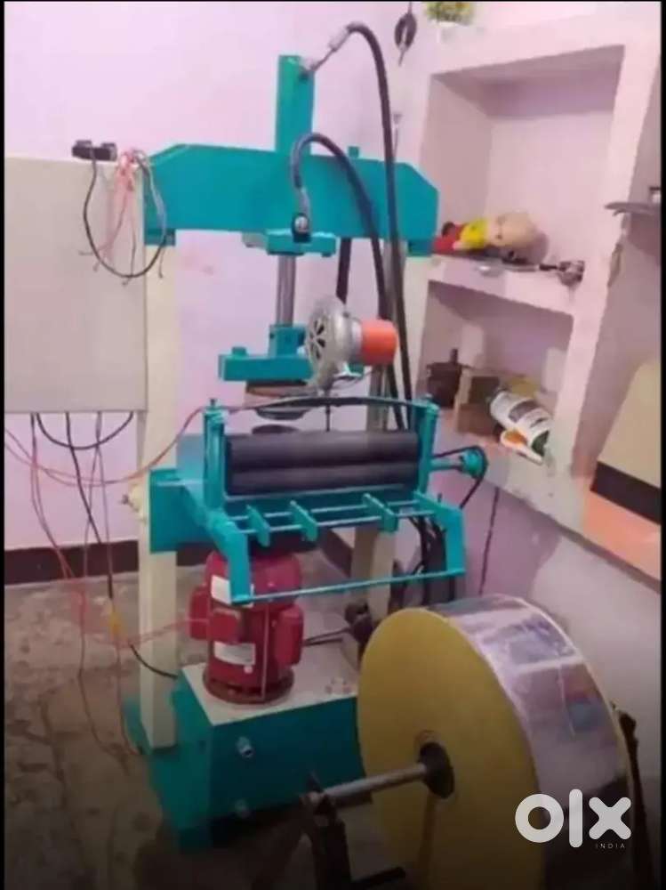 Automatic & Semi Automatic Hydraulic Dona Pattal Machine