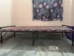 One year old foldable bed attached with mattress