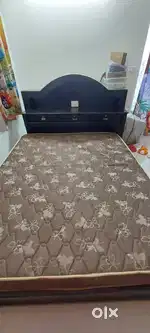 Heavy wood and ply  bed which is in gud condition