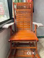 Foldable Grand Father rocking chair with an accupressure section
