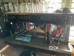 Coffee machine with grinder