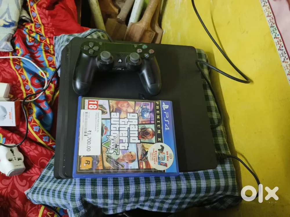 ps4 slim 500gb with original controller with one year warranty