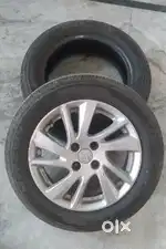 2 MRF tyres 175/65/15 and 1 alloy for swift Car.