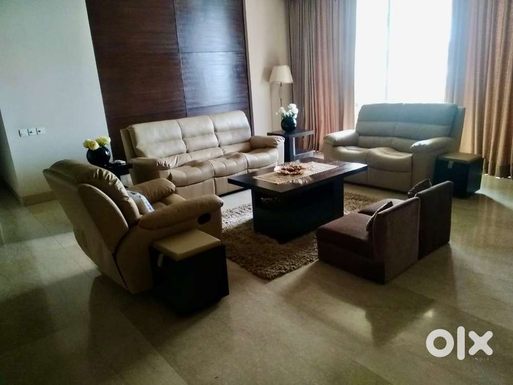 New condition Sofa 3+2 +2+ centre table + side tables. Free delivery