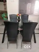 Damro glass dining table with 4 chairs