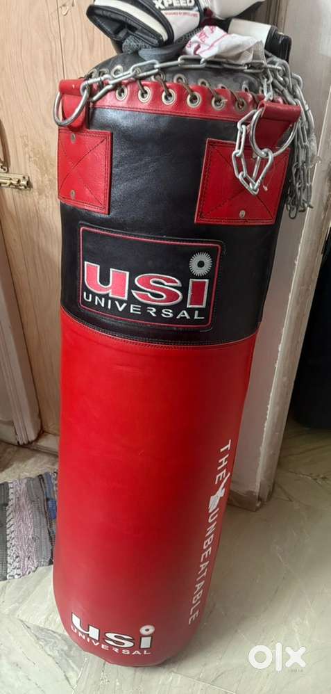 Universal USI hard punching bag and gloves brand new