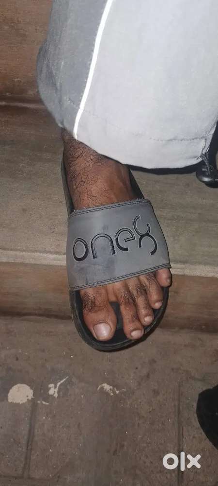 Puma and one 8 orginal slipper