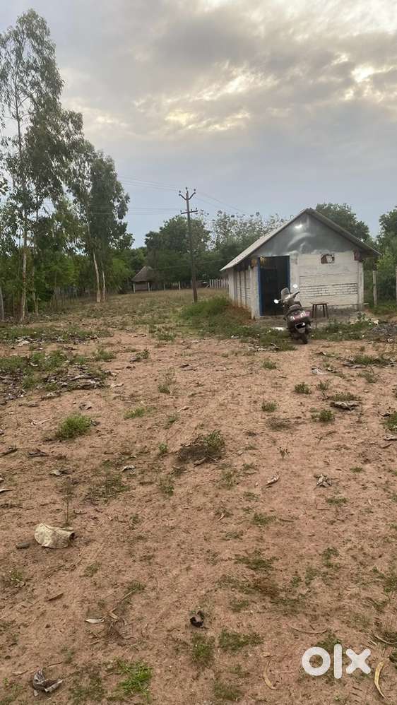 Land , House with eb and water connection