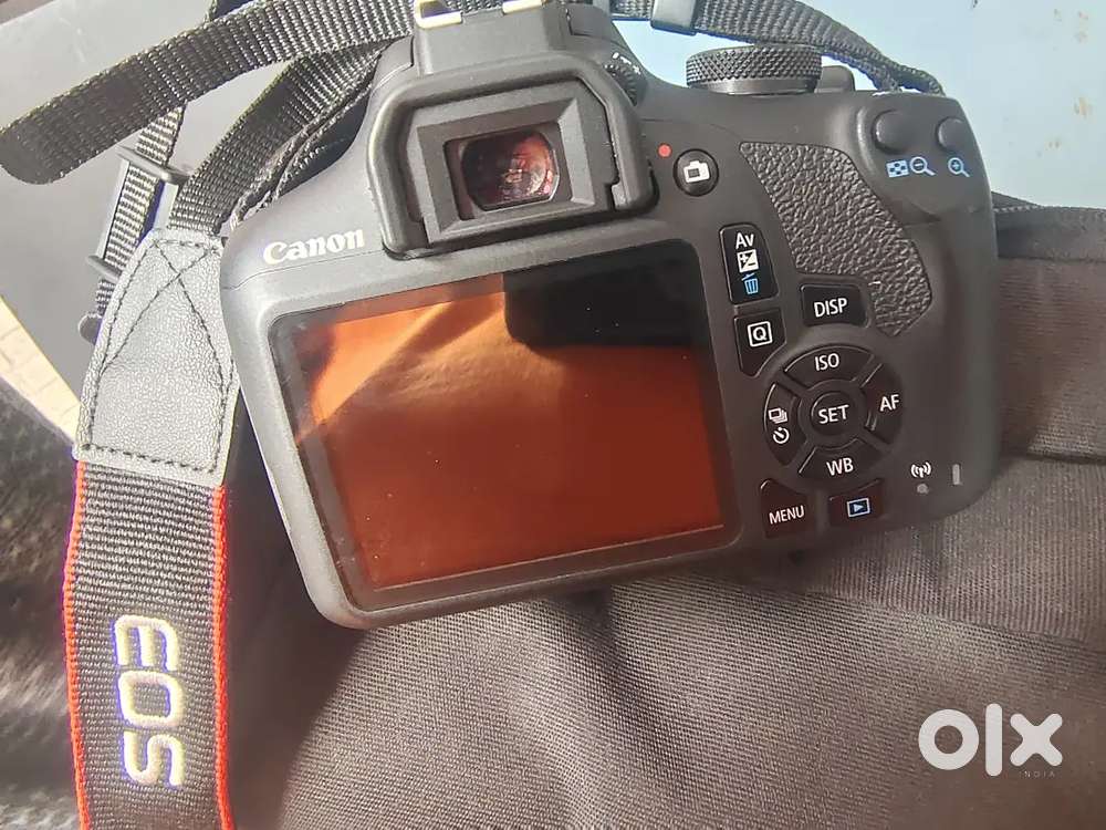 Canon 1500D along with two 18-55mm lens