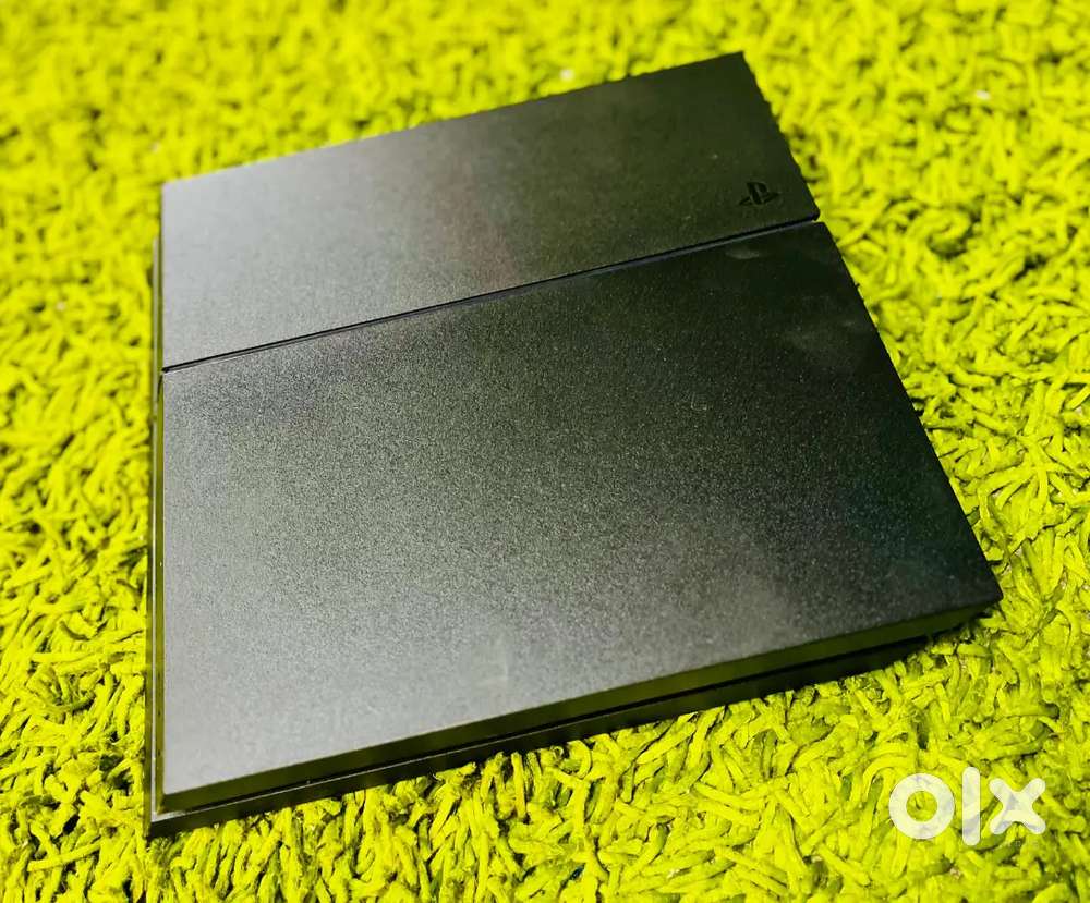 Standard PS4 available for sale with games