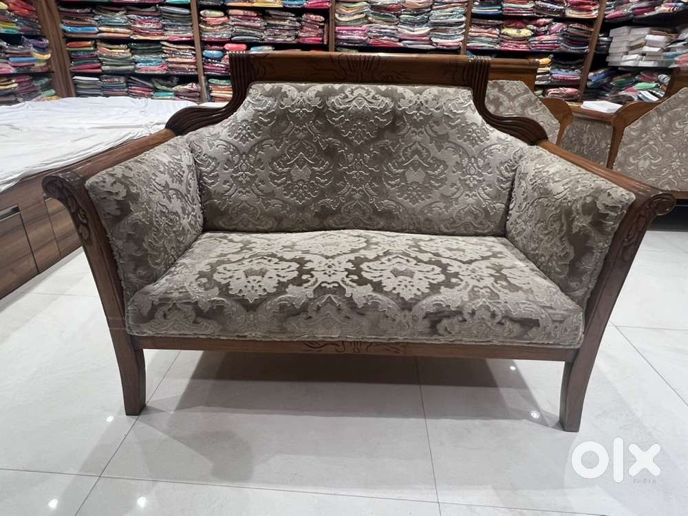 Two seater wooden carved sofa. 3 nos