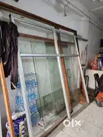 Glass door and glass wall and wooden frem