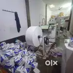 Napkin packing and machine operator