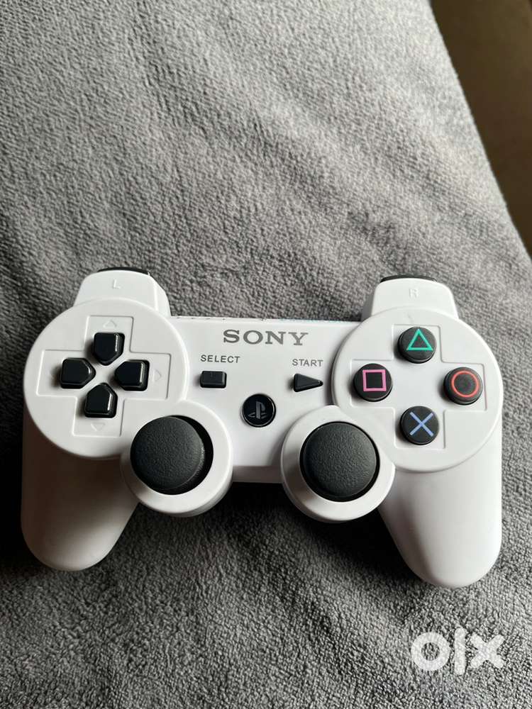 Playstation 3 camera and 2 controllers