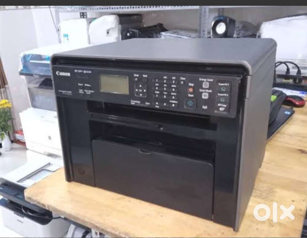 Compact Canon MF3010 Laser - Desk-Friendly 3-in-1 & Instant Start!