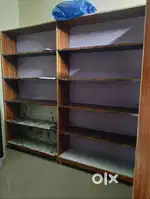 There are four wooden racks each has five rows in it