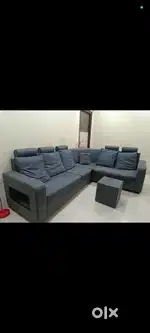 L - Shaped Sofa blue color one in good condition