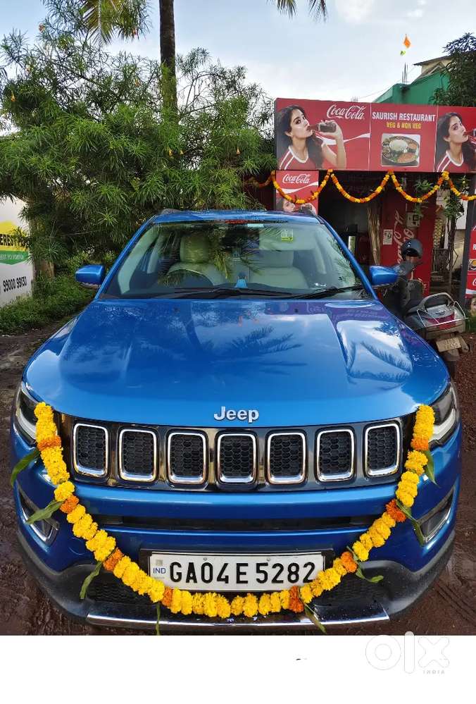 Jeep Compass Diesel 2.0 Manual 17kms mileage on AC, hydro blue colour.