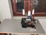 Inter lock sewing machine