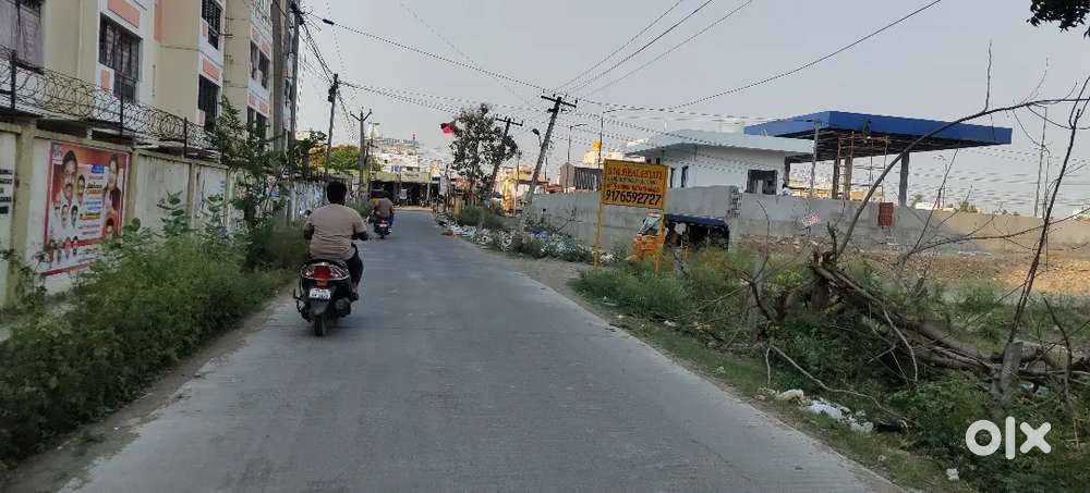 MANIVAKKAM RUBY BUILDING OPPOSITE side plot