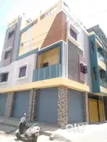 Semi commercial building with duplex house car parking in medahalli