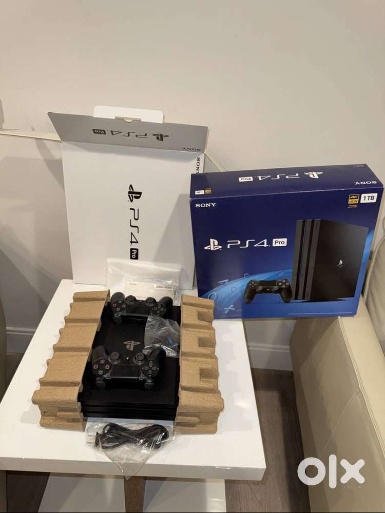 Sony PlayStation 4 Pro Console With 3 Games & 2 Controllers