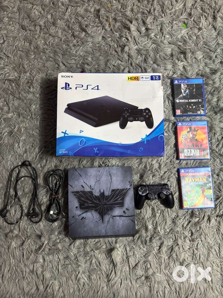 PS4 Slim 1 Tb with 10 pre installed games and 3 cds