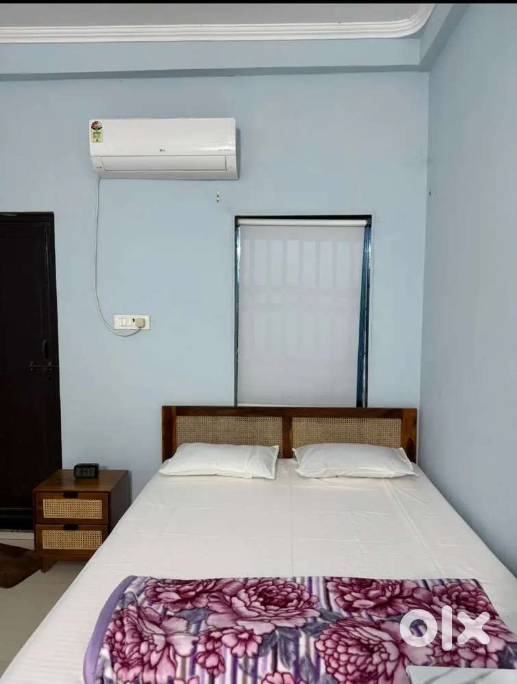 Fully furnished room with attached bathroom