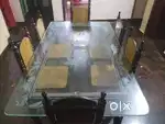 Dining table with 6 chairs and glass top