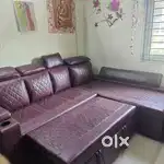 L shape luxury sofa cum bed with storage and a lounger