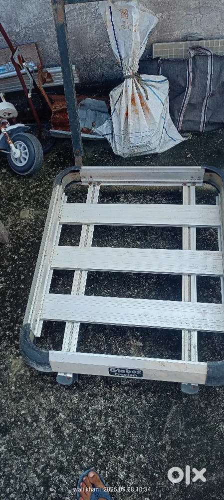 Small car parts selling; Upper almunium carrier  & back steel gard.