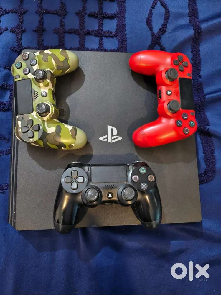 PS4 Pro 1TB + 3 Controllers + 4 Games  Excellent Condition