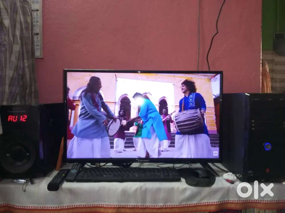 PC with 32 inch TV Cum monitor 1 TB ROM 4 GB ROM and Home Theater set