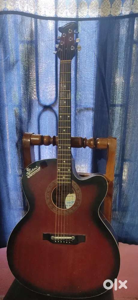 Signature acoustic guitar
