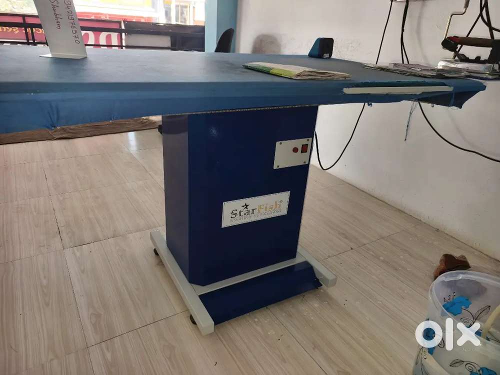 Vaccum ironing table steam press