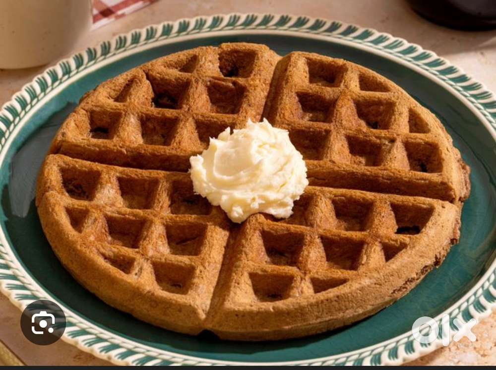 Waffle maker and helping staff