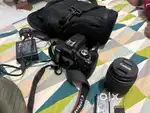 canon eos 2000 d camera with lens