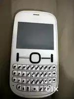 It is a mobile working properly slight black dots are on the keys