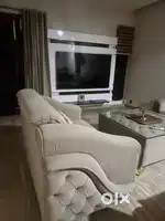 Beige 7 Seater Sofa & Glass top Table