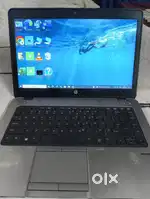 Hp laptop with charger and keyboard