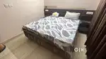 King size velvet touch Double bed eith side table .