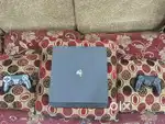 PS4 Pro with 2 DualShock controllers