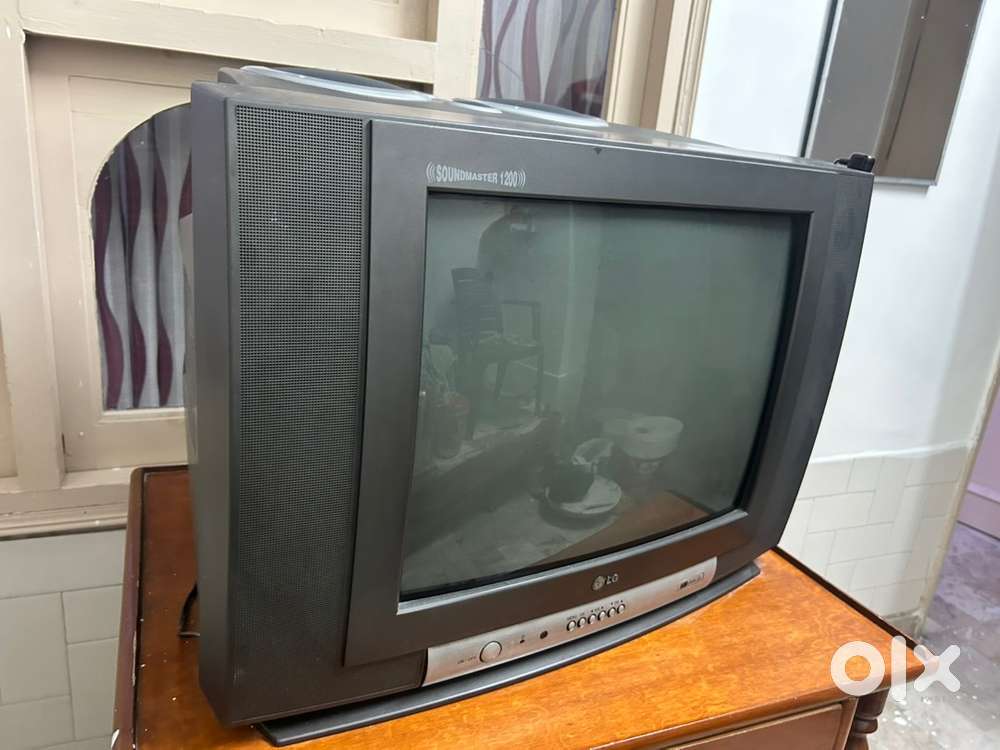 Lg tv + TV trolley(dinner set furniture)