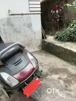a black coloured Honda Activa at a very good condition