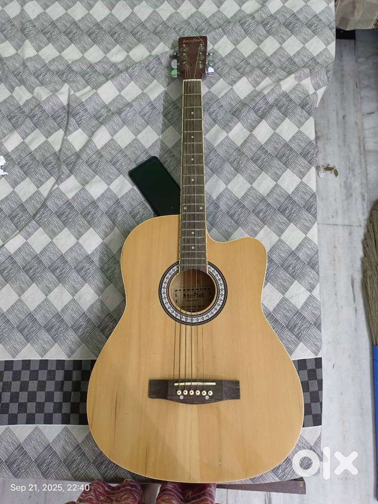 Krafter acoustic guitar 4 years old